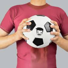 Man in red T-shirt holding custom promotional soccer ball with PromoPAL logo and grey background